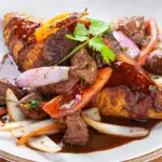 TACU TACU CON LOMO SALTADO