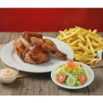 Medio Pollo (Papas Fritas -Ensalada)