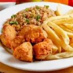 Chicharrón de pollo con chaufa