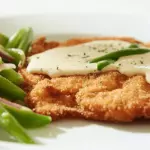 pechuga apanada y gratinada