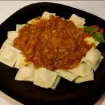 Ravioles con salsa