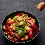 Schezwan Chicken Dry (8 pcs)