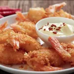 CAMARONES EMPANIZADOS AL COCO