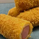 Enrolado de salsicha com queijo