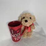 Coffee mug with stuffed animal