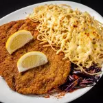 Milanesa con Fideos