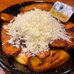 Ración de tajadas con queso