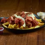 SALCHIPAPA DE LA CASA