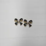 Joyería - (Lacitos negros c/perla)