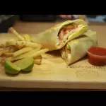 BURRITO DE PECHUGA EMPANIZADA
