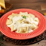 Ravióli de Brie com Damasco