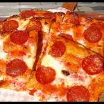 Porción pizza peperoni