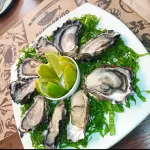 OSTRAS CRUDAS O PARMESANA