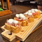 Brusqueta de Parma e burrata
