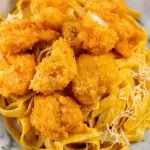 FETUCCINI A LA HUANCAINA LANGOSTINOS