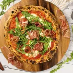 Prosciutto y arugula