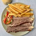 Vacío con papas fritas.