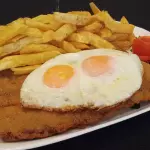 Milanesa a Caballlo c/Guarnición