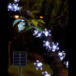 Cadena de iluminación solar flores