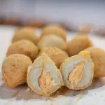 cento de salgadinhos fritos