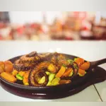 Pulpo A La Parrilla En Salsa Anticuchera