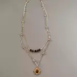 Collar cafe con sol