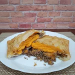 8) Carne com cheddar