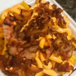 Batata Frita Cheddar e bacon