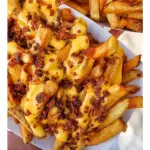 PAPAS C/QUESO NACHOS Y TOCINO