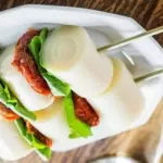 Palmito com rucula e tomate seco