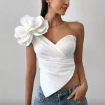 Blusa con flor grande a un lado