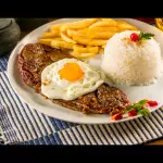 Contra filé a cavalo com fritas