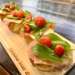 Brusqueta de tomate confit e Parma