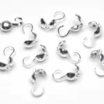 Tapa nudos color plata