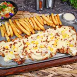 Pechuga en Salsa de Maiz y Tocineta