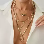 Conjunto collar triple y collar sol