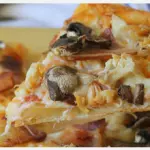 Porcion pizza pollo con champoñones