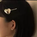 Hair clip de  1 corazón dorado