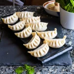 DUMPLING DE CERDO Y CEBOLLINA 生葱花猪肉饺