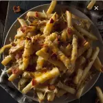 Papas fritas con Mechada y Queso