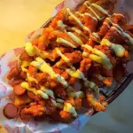 Salchipapas con tiras Crunch