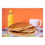 Hot cakes en salsa de Nutella con platano