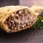 Carne com queijo