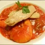 Langostinos entomatados