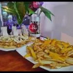 Papas fritas gratinada
