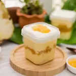 Bolo de pote de ninho com abacaxi