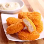 NUGGETS DE POLLO + PAPAS FRITAS