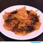 Porção de carppacio de salmão