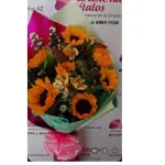 Arreglo con girasol, y astromelias