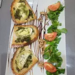 Ensalada de cabra caliente